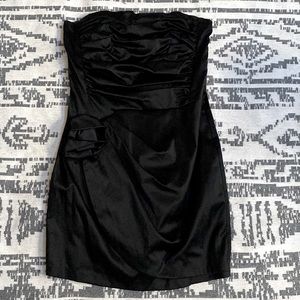 Jessica McClintock Black strapless dress with lots of ruffles. Never worn.